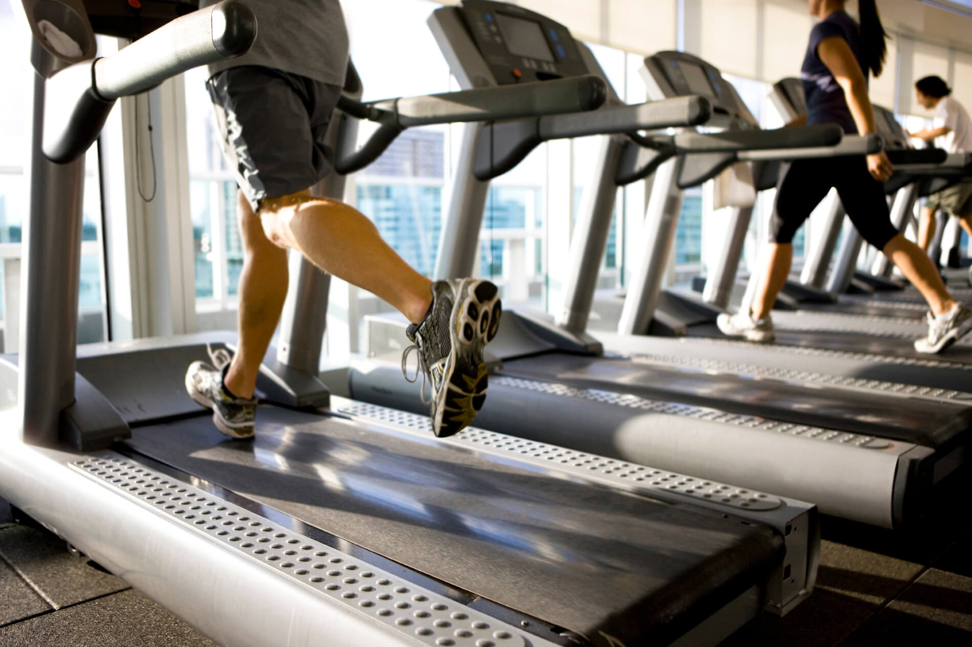 People running on treadmill