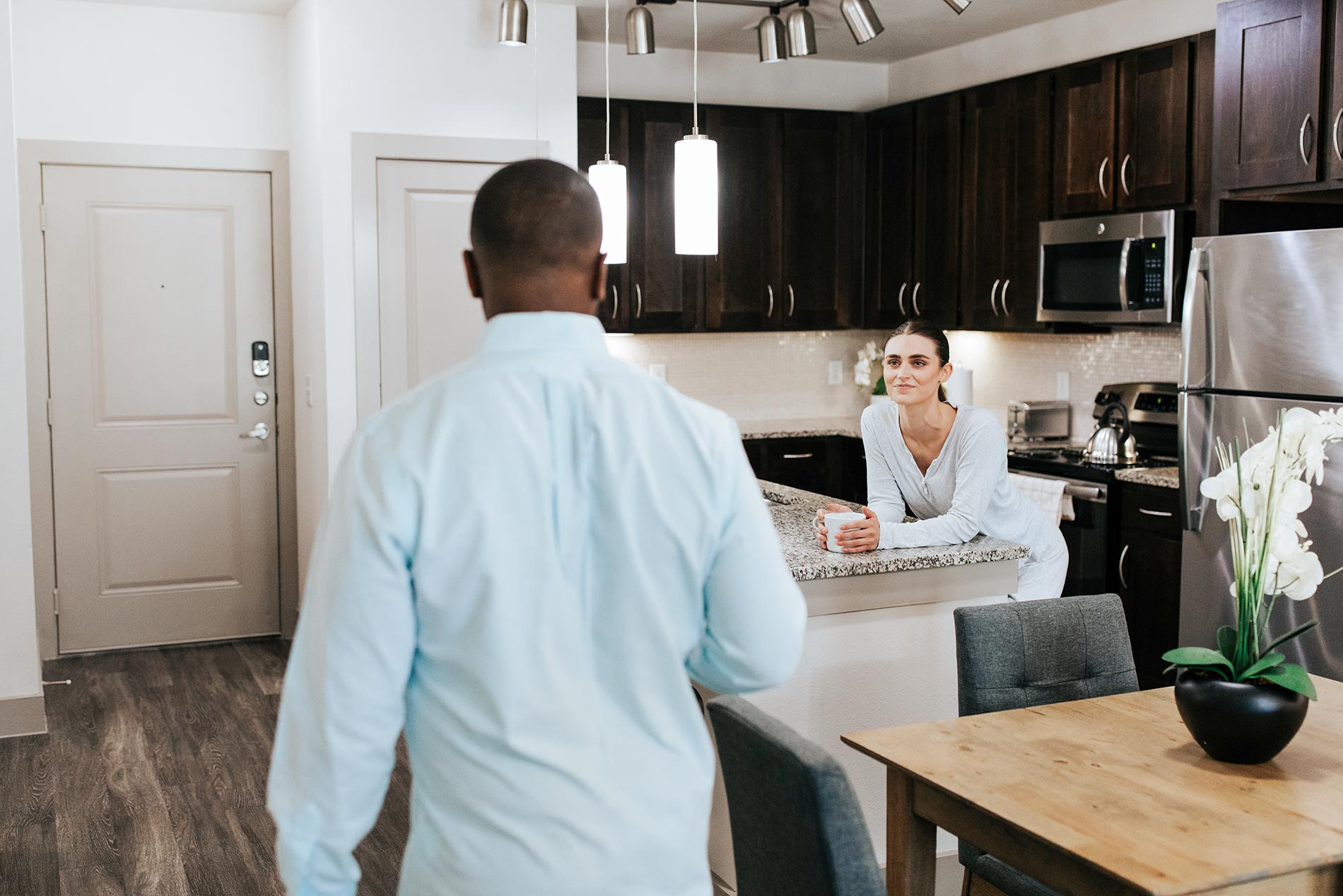 Villaggio man and woman in kitchen