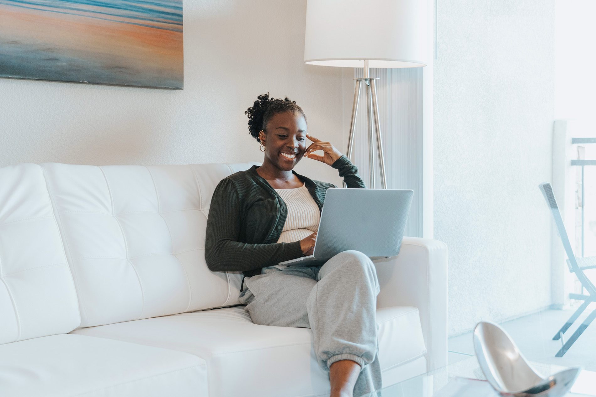 Windermere woman with laptop in living room